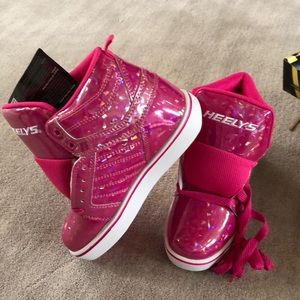 Brand new Pink Heely high tops